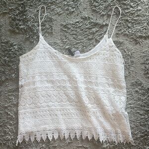 Divided lace tank top